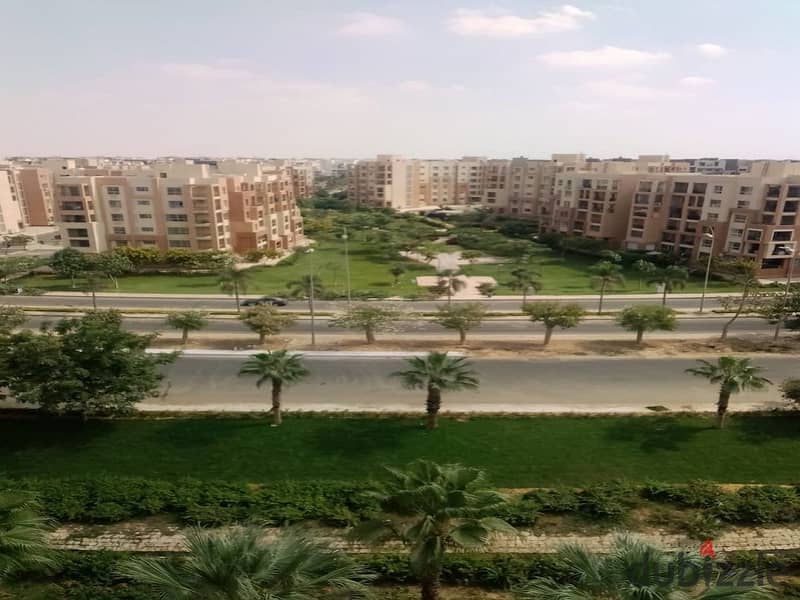 In Madinaty, an apartment for rent, 208 sqm, with an open view, will not be repeated, in front of the Food Court, the Club, and the Exhibition Market, 9