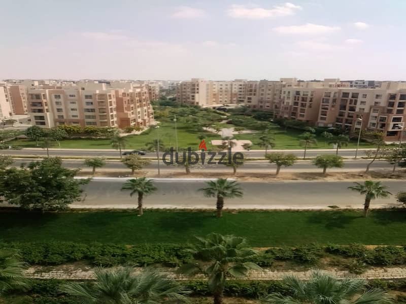 In Madinaty, an apartment for rent, 208 sqm, with an open view, will not be repeated, in front of the Food Court, the Club, and the Exhibition Market, 10