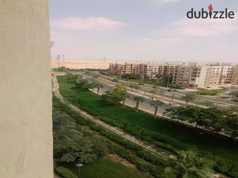 In Madinaty, an apartment for rent, 208 sqm, with an open view, will not be repeated, in front of the Food Court, the Club, and the Exhibition Market, 11