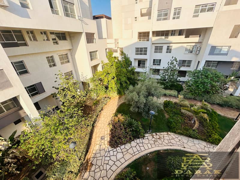 "Apartment for sale in Madinaty, 200 sqm, in the most prestigious phase B8, garden view. " 8