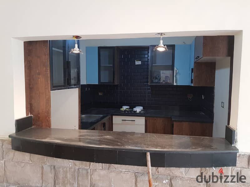 Ground floor apartment with garden and kitchen for rent in the compound Galleria  Golden Square 7