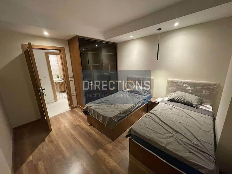 Next to City Center Almaza , at a special price, an apartment with hotel finishing and air conditioning for sale in Compound | VALORE SHERATON | 2