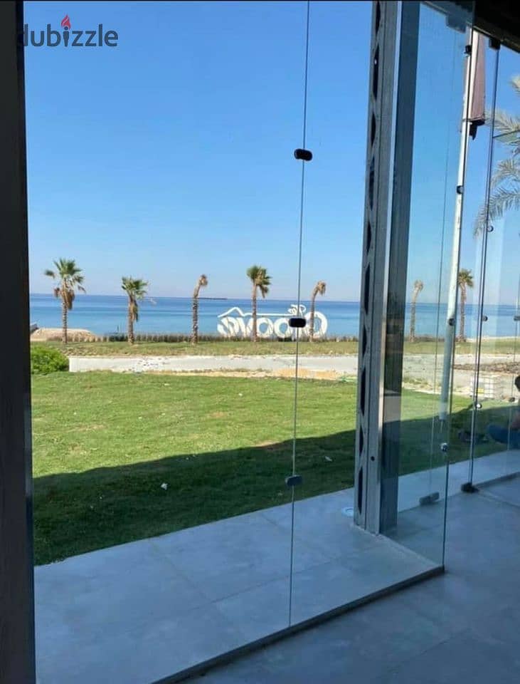 The last chalet to be delivered, 100 square meters on the sea, for sale in Ain Sokhna, in installments, The Groove, triple view, sea, lagoons and swim 6