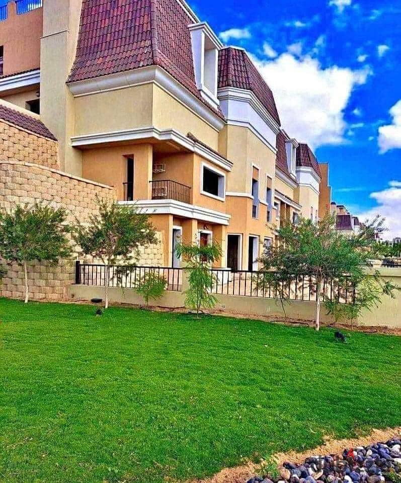 With a 42% discount, an apartment for sale, ground floor, in a garden, next to Madinaty, in a distinctive Saray Block compound in New Cairo. 1