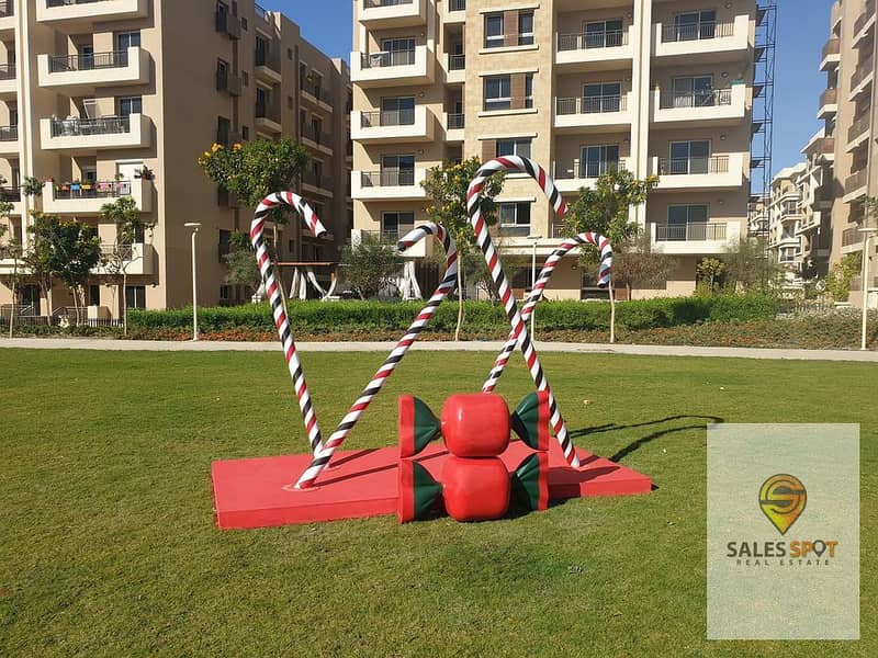 With a 5% down payment, a 133 sqm two-bedroom apartment for sale in Taj City, First Settlement, directly in front of the airport and near Al-Rehab 4