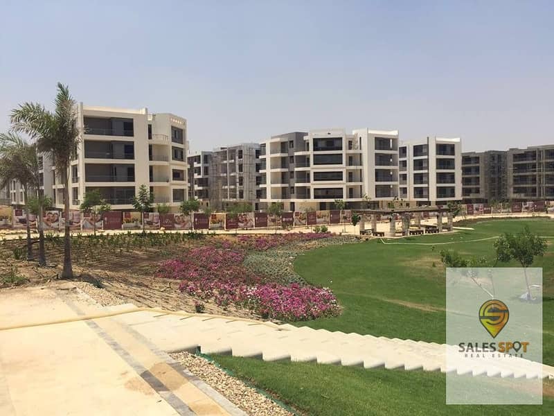 With a 5% down payment, a 133 sqm two-bedroom apartment for sale in Taj City, First Settlement, directly in front of the airport and near Al-Rehab 6