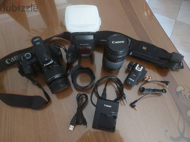 Canon 1100D + 18-55mm + 75-300mm + flash godox + transmitter + Bag 6