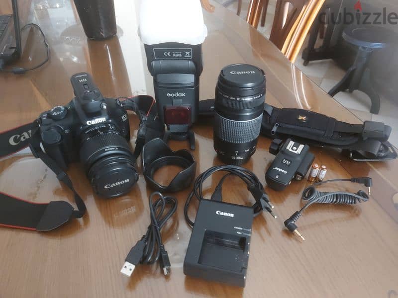 Canon 1100D + 18-55mm + 75-300mm + flash godox + transmitter + Bag 7