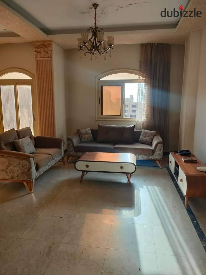 An apartment for sale with mattresses and appliances in Nakheel compound near Wadi Degla club 1