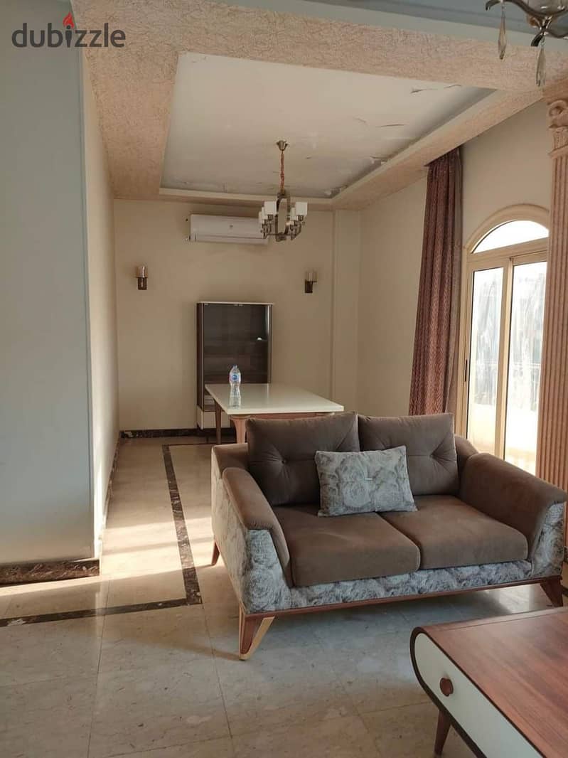 An apartment for sale with mattresses and appliances in Nakheel compound near Wadi Degla club 2