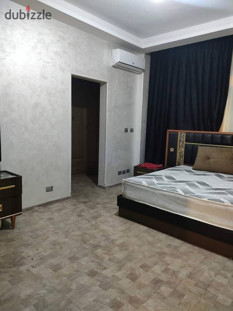 An apartment for sale with mattresses and appliances in Nakheel compound near Wadi Degla club 7