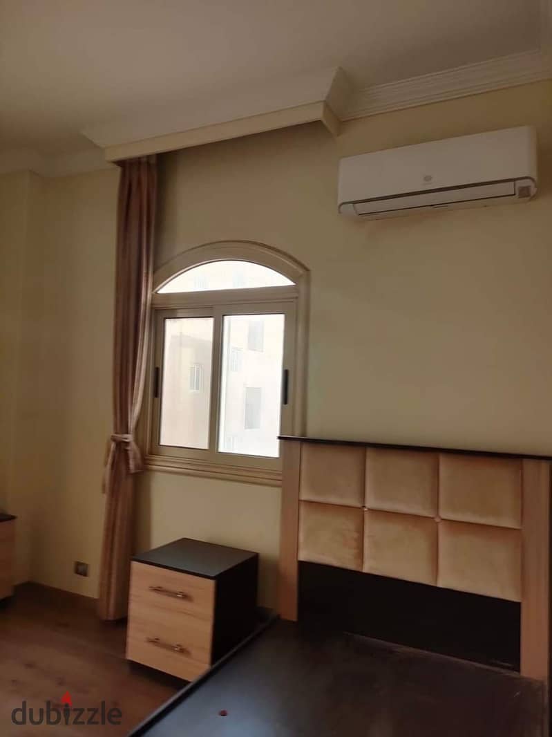 An apartment for sale with mattresses and appliances in Nakheel compound near Wadi Degla club 8