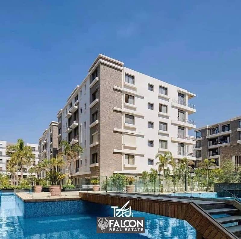 Apartment with the lowest down payment and the highest discount directly in front of the airport for sale with 8 years installments Taj City New Cairo 8