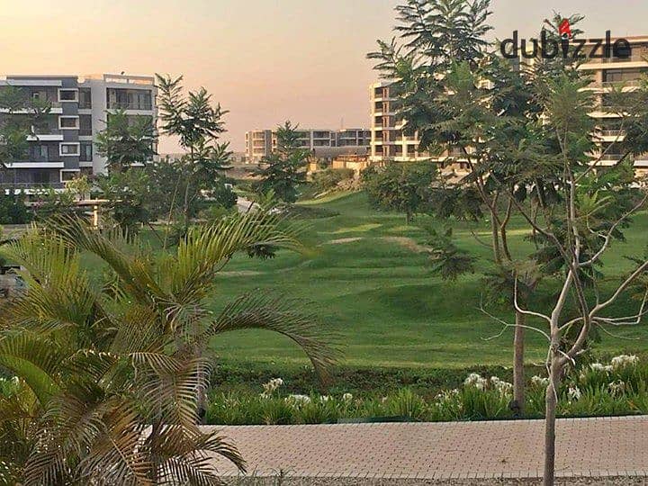 For sale, studio 70 m with a large garden 102 m in Taj City, in front of Cairo Airport, on the Suez Road, with a down payment of 674K 1