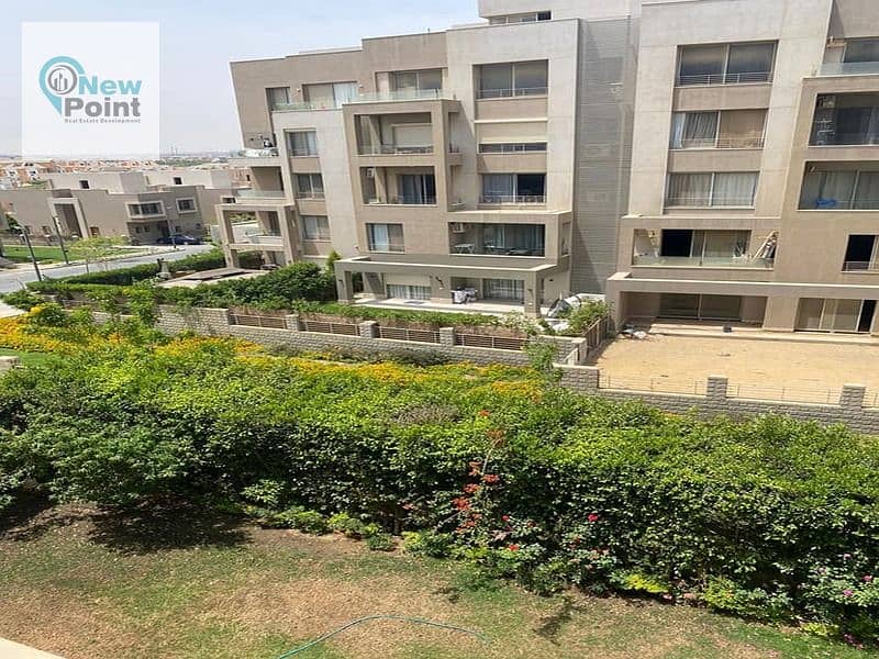 Ground floor apartment with garden for sale in Palm Hills New Cairo, Cleo phase, direct on the lagoon, with installments over 8 years 2