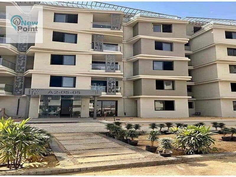 Ground floor apartment with garden for sale in Palm Hills New Cairo, Cleo phase, direct on the lagoon, with installments over 8 years 6