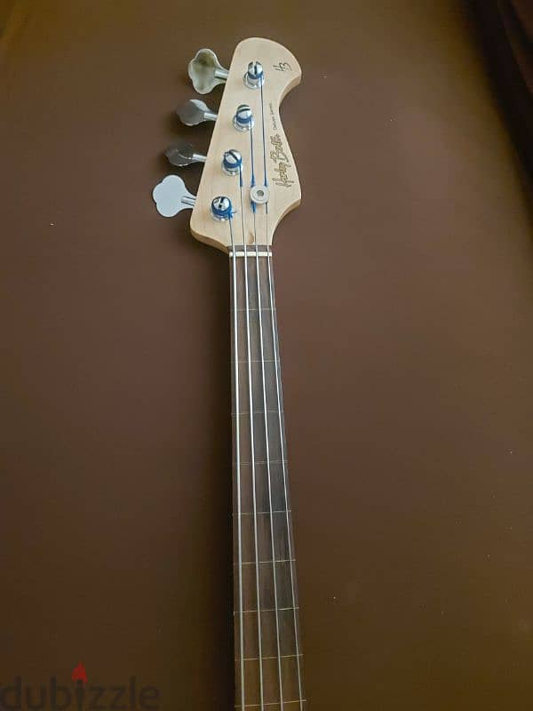 bass guitar. . . fretless harley benton jazz bass. .  by fender 3