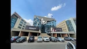 office for sale  beside AUC new cairo | installments | delivery 1 year | prime location 2