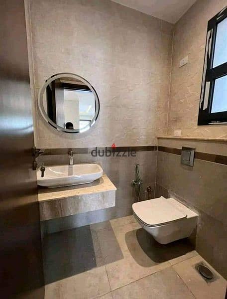 Apartment for sale in Taj City Compound in front of Cairo International Airport and Cairo Festival at a very special price, compound ready for inspect 7