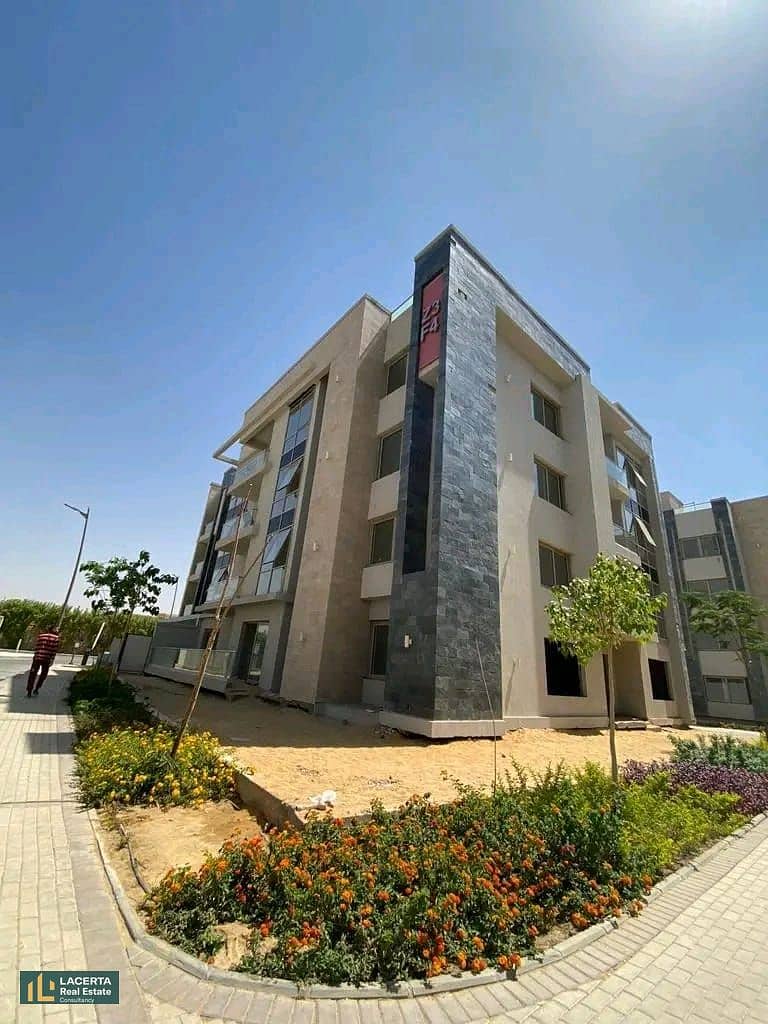 Apartment for sale, 131 sqm, open to a garden, in front of the airport and on Suez Road, installments for 8 years, in Taj City, Cairo 8