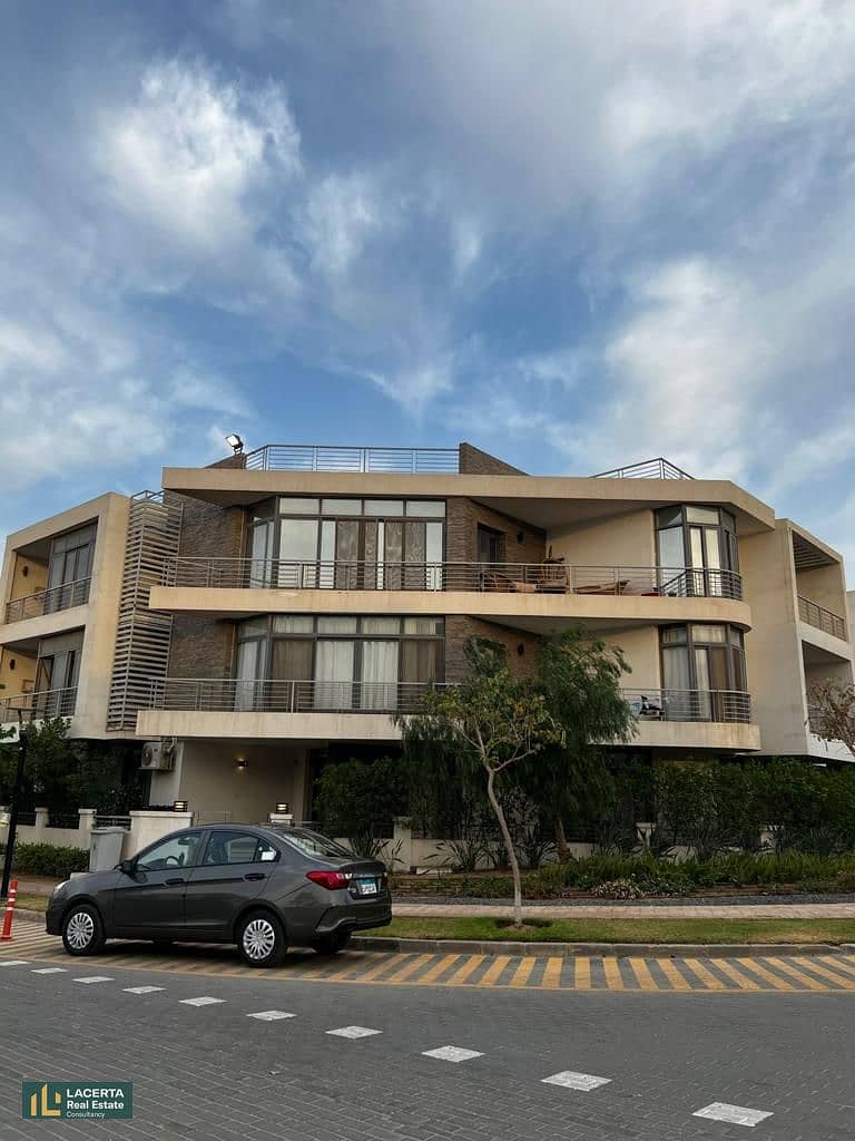 For sale at a 42% discount, a corner apartment directly in front of Cairo Airport for sale in installments in Taj City Compound, New Cairo, Fifth Sett 2