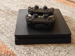 Play station 4 with Two controllers in perfect condition