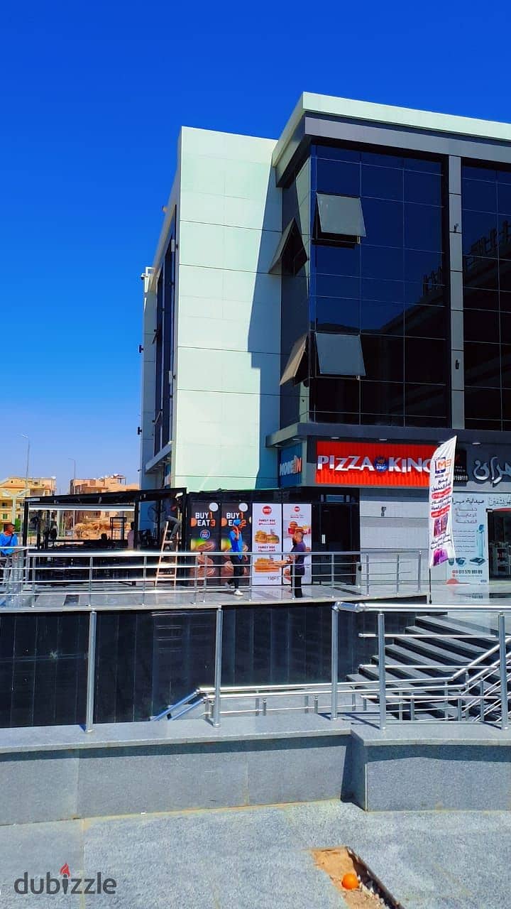 For sale, a commercial store with an area of ​​​​15 square meters, directly on the façade, in the best mall in Shorouk 8