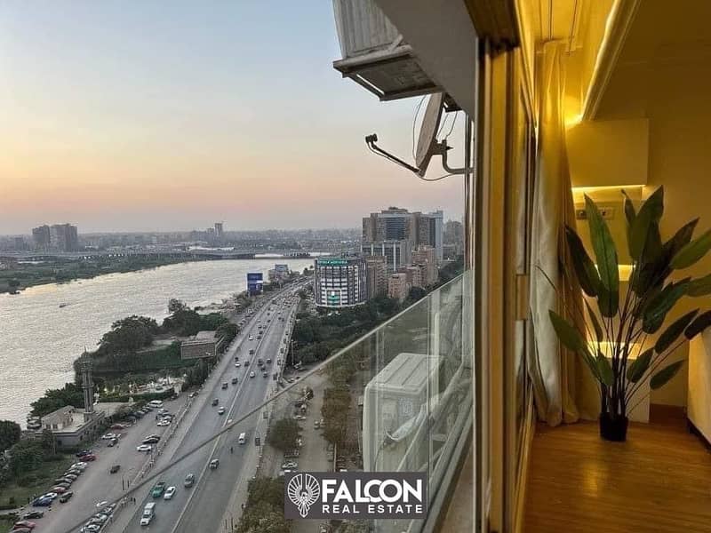 Panorama view on the Nile hotel apartment for sale furnished best location on Maadi Corniche next to Hilton in installments over 5 years REVE DU NIL T 2