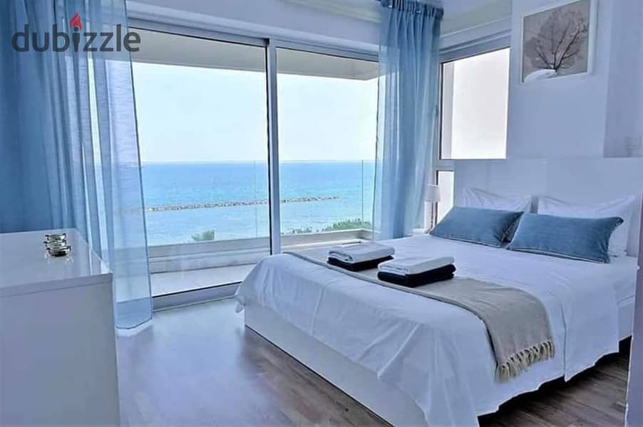 First row apartment directly on the lagoon  fully finished  immediate delivery  in front of El Alamein Towers in the Latin district 0