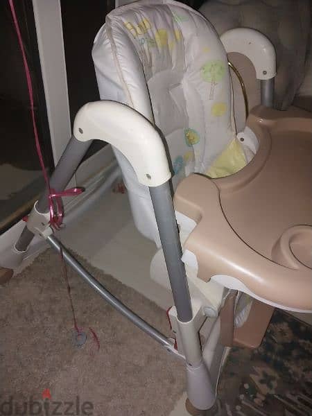 كرسي طعام جونيور . . high chair Junior 1