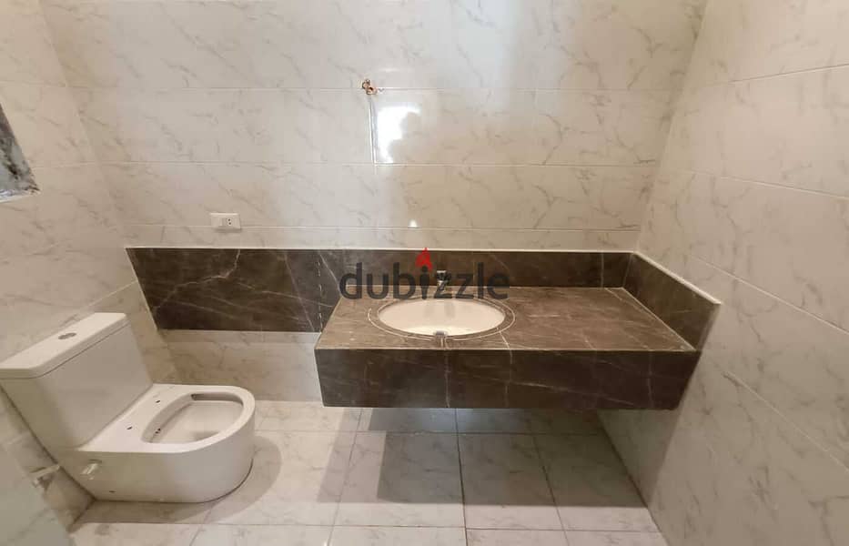 Apartment for sale in Mountain View iCity, New Cairo, semi-finished, with a distinctive view 12