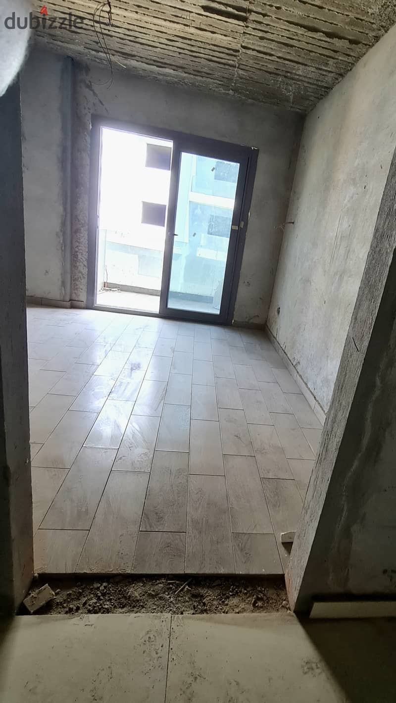 Resale apartment with immediate delivery in Sun Capital Compound 3/4 finished with a distinctive view Landscape View | October - Ashgar City - Ashgar 7