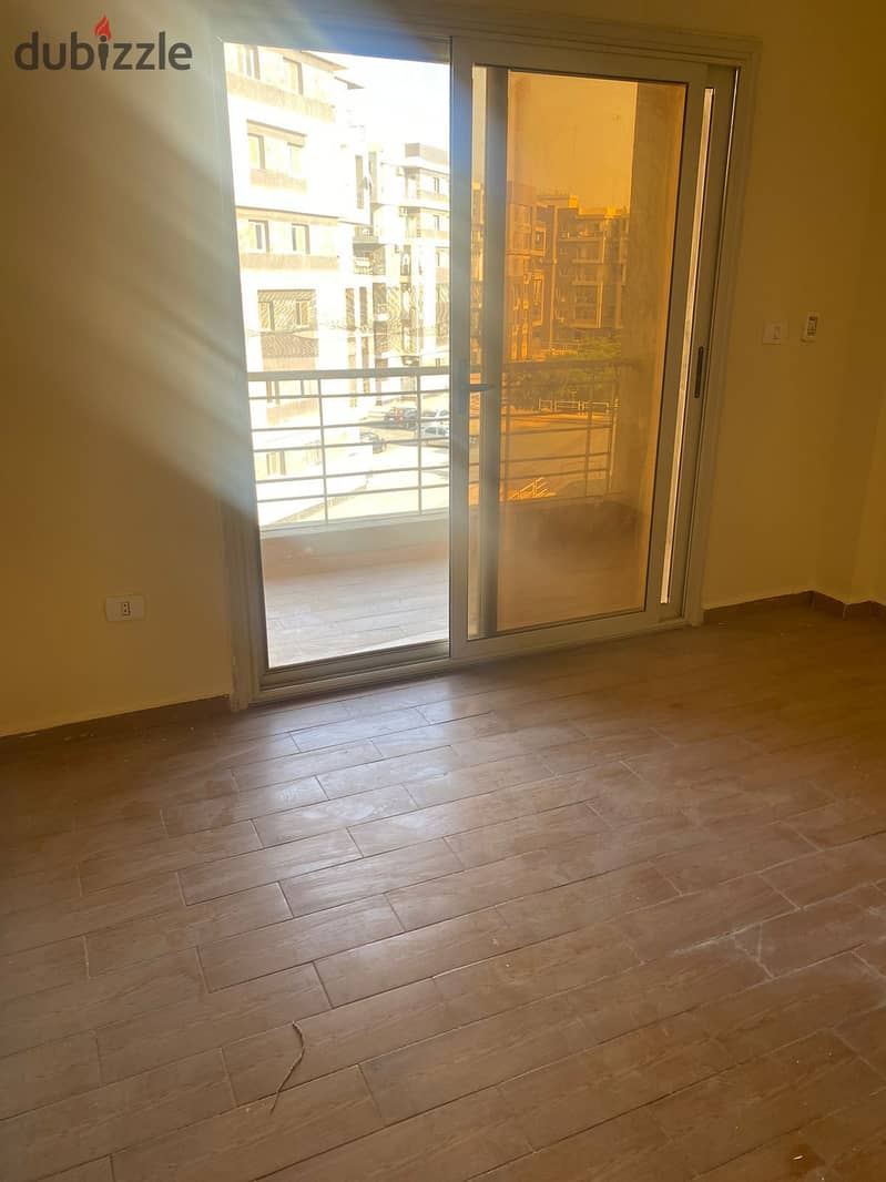 Apartment for rent in El Tagamoa, Dar Misr Compound, El Qarnful, Model A, next to the mosque and the service area  East  Open view 6