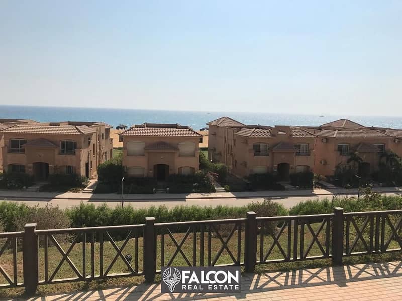 For sale, a ground floor chalet + garden ((first row on the sea)) ultra super deluxe finishing in Ain Sokhna Hills, next to Porto 5