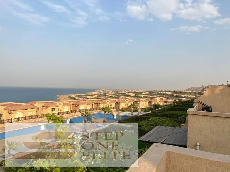 Twin villa for sale, first row to the sea, in the most upscale villages of Ain Sokhna (Telal Shores), with super deluxe finishing 5