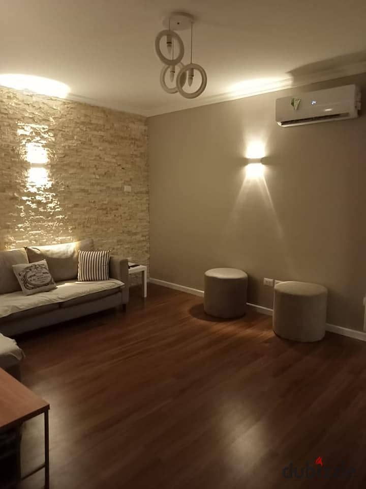 Apartment for sale in New Cairo, a prime location in the heart of the Fifth Settlement, in installments without interest { Palm Hills Compound } 1