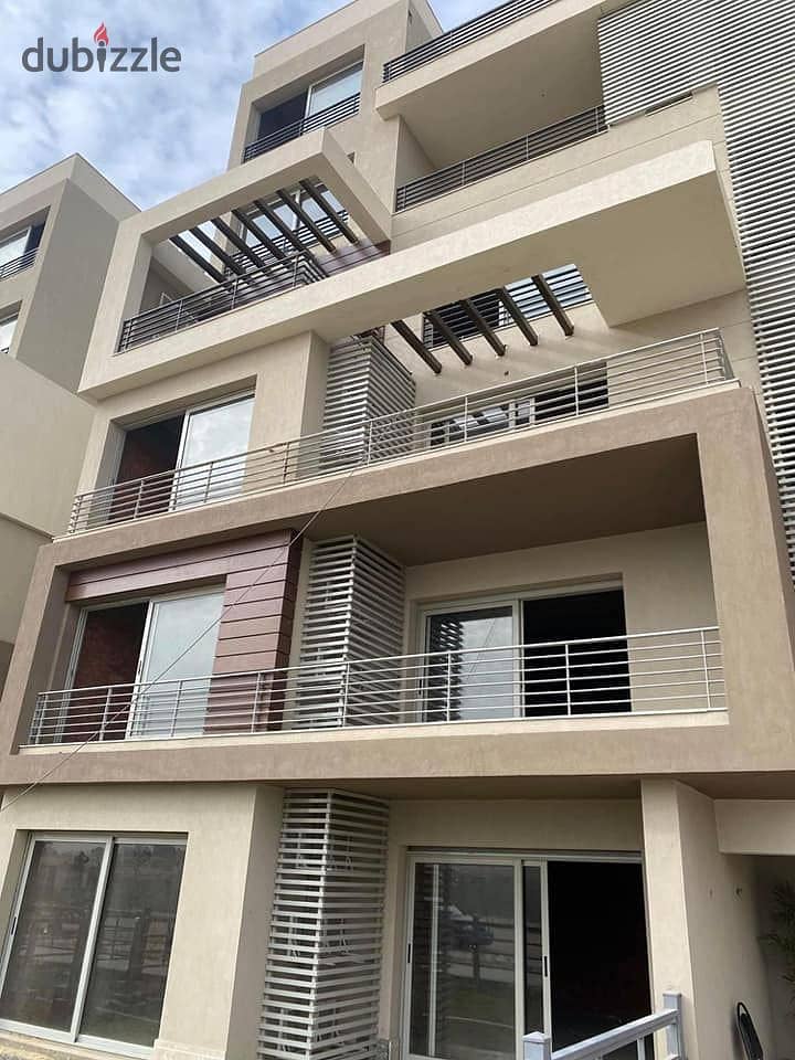 Apartment for sale in New Cairo, a prime location in the heart of the Fifth Settlement, in installments without interest { Palm Hills Compound } 9