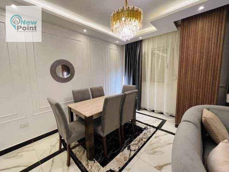 Receive a 3-room apartment, finished with air conditioners and a kitchen, next to the diplomatic district in the administrative capital 3