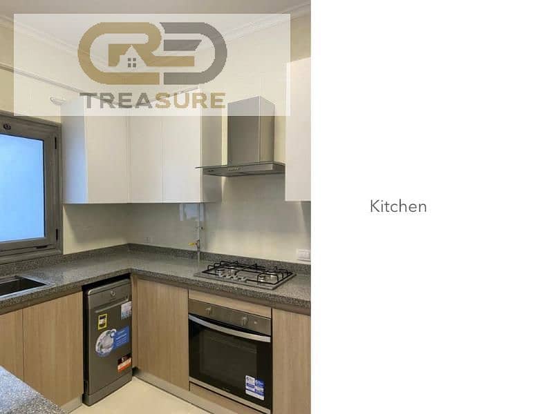 Apartment for sale in Eastown Kitchen with appliances + ACs 1