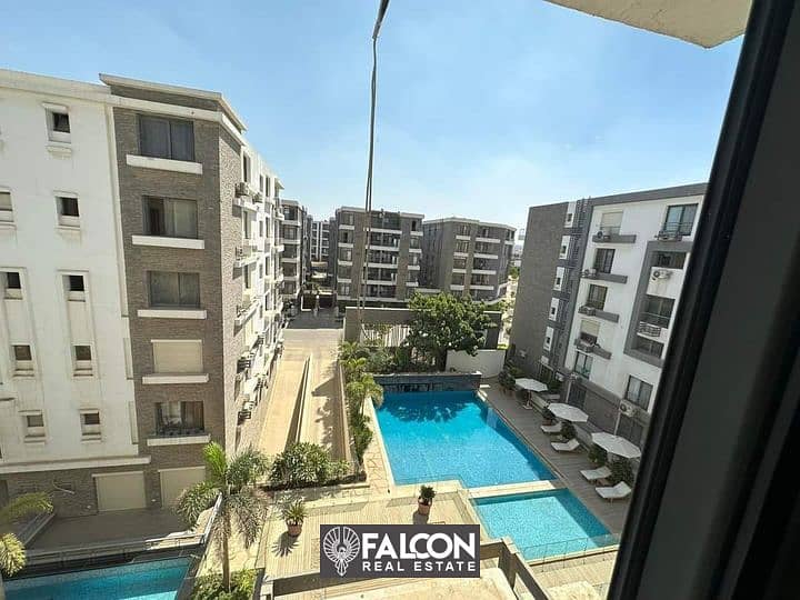 For sale, an apartment in Taj City Compound, next to Cairo International Airport, in the heart of the Fifth Settlement, 42% discount available in case 3