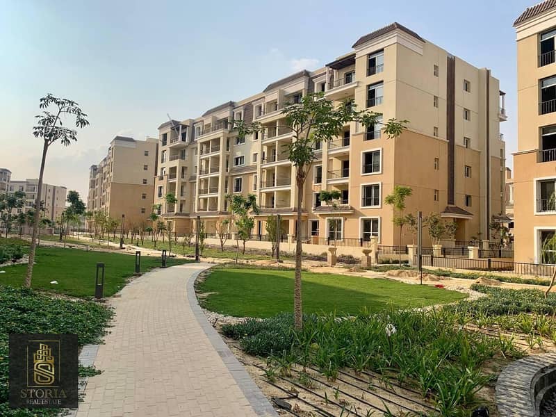 For sale in installments over 8 years, an apartment in Sarai Compound on Suez Road and directly next to Madinaty 4