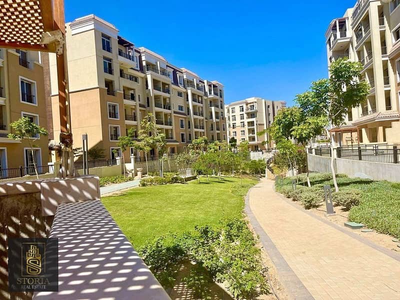 For sale in installments over 8 years, an apartment in Sarai Compound on Suez Road and directly next to Madinaty 12