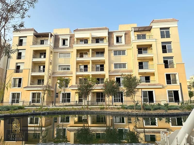 For sale in installments over 8 years, an apartment in Sarai Compound on Suez Road and directly next to Madinaty 15