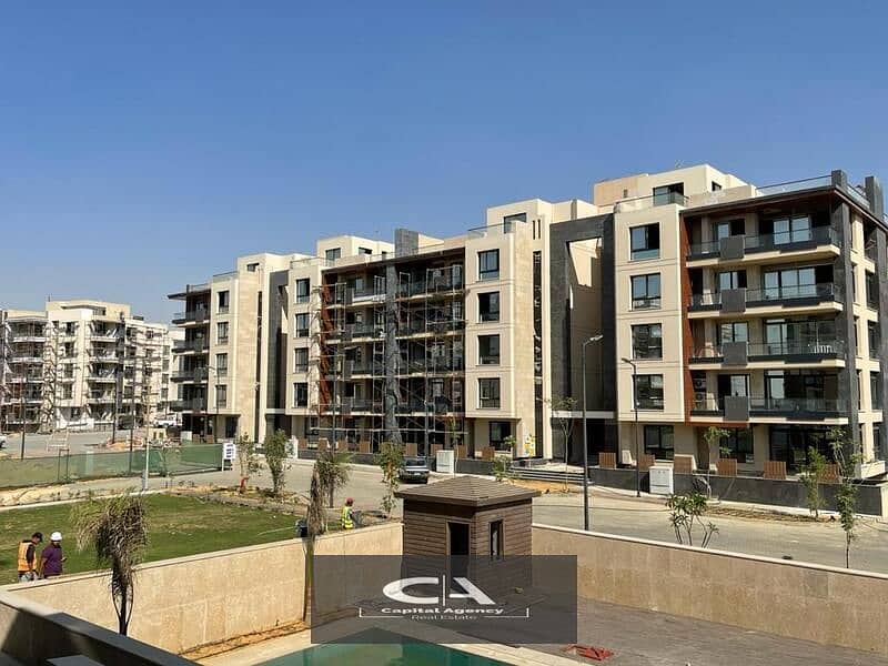 Ready to move own your apartment with a  roof, 4/3 finishing, in Azad Compound in the heart of Fifth Settlement A distinctive view of the lagoon 15