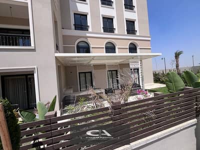 Over the cityscape, an apartment for sale, fully finished, with the real estate developer, Dorra, in the heart of New Zayed, in the Village West Compo