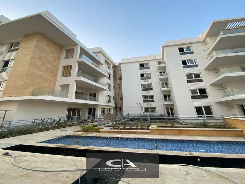 Apartment for sale with garden in Mountain View iCity in the heart of October With only 10% down payment Prime location with view on the lagoon * Moun 0