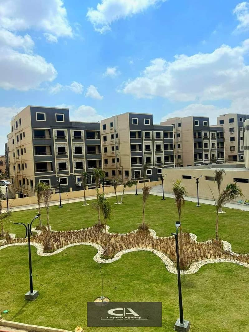 Apartment for sale, immediate delivery, with a 32% cash discount, in the heart of the compound, with a landscape view, or a 10% down payment in Sephor 2