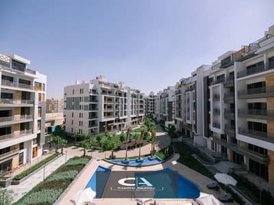 Own an apartment with a garden of 50 meters in the Fifth Settlement with a 30% cash discount in Golden Square - Icon Gardens Compound_15% down payment