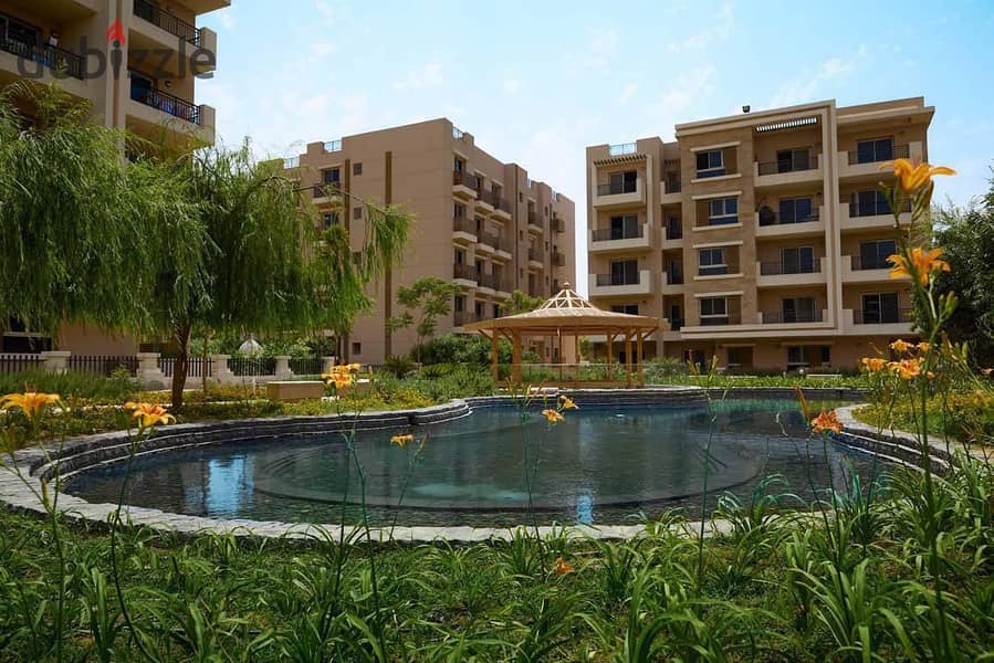 Duplex for sale with a distinctive view in front of Cairo Airport at a very attractive price in Taj City, Fifth Settlement 9