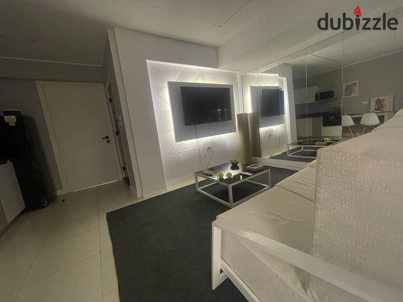 Ultra super luxury furnished studio apartment for rent in the Fifth District, close to services - Fifth Settlement 3